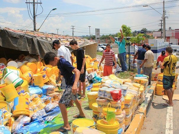 Truck with 14 Tons of Paint Rolls Over Painting the Road in Vibrant Colors Truck with 14 Tons of Paint Rolls Over Painting the Road in Vibrant Colors