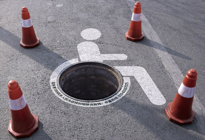 How Many More Lives Will Cost $1.25? Please Call 010-62357575 To Report Manhole Cover Theft