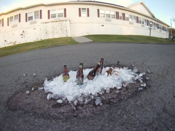 Pothole Photo Contest Encourages Locals To Submit Hilarious Photos Of Potholes