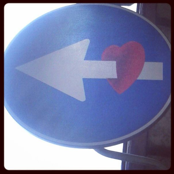 Street Sign Art By Abraham Clet - Barcelona Street Sign Art By Abraham Clet - Barcelona