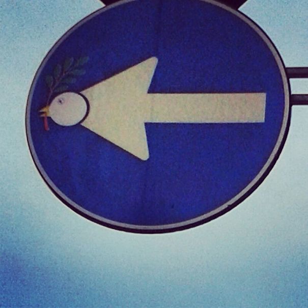 Street Sign Art By Abraham Clet - Barcelona Street Sign Art By Abraham Clet - Barcelona