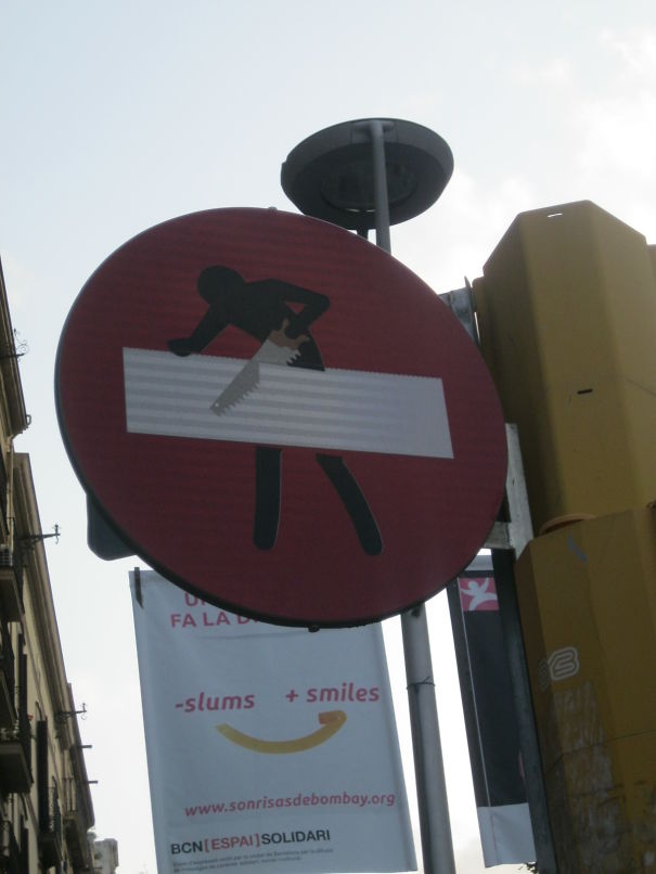 Street Sign Art By Abraham Clet - Barcelona