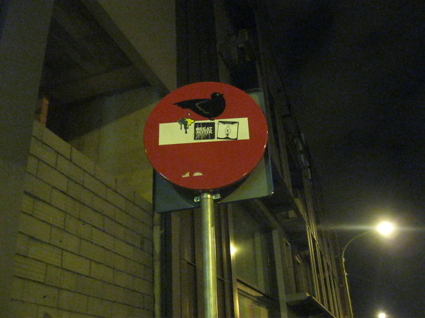 Street Sign Art By Abraham Clet - Barcelona Street Sign Art By Abraham Clet - Barcelona