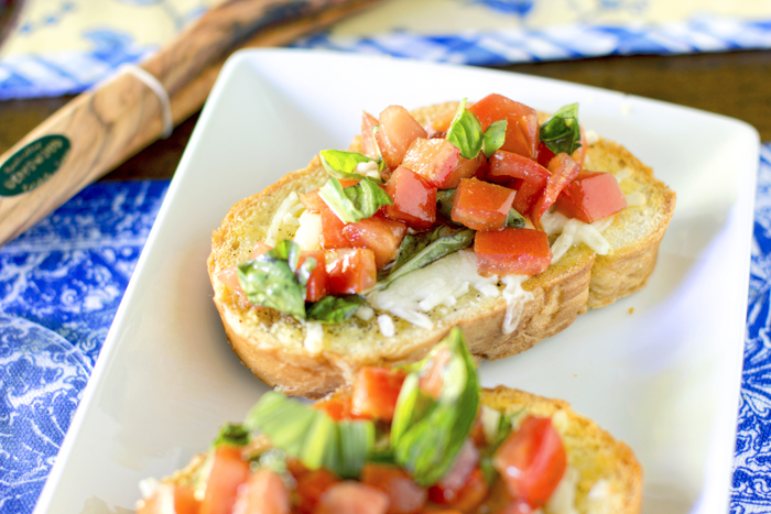 Caprese Crostini (crostini W/ Mozzarella, Tomato, Basil, And Herbs)