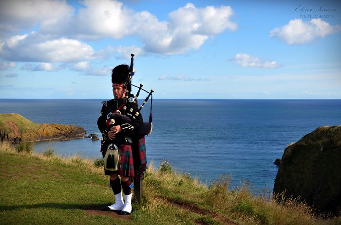 A Bagpiper At Dunnotar Castle