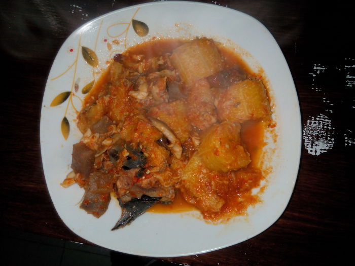 Boiled Plantain In Pepper Sauce With Cow Hide, Catfish And Titus Fish