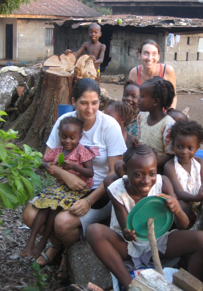Sierra Leone - Getting A Ride On A Poda Poda