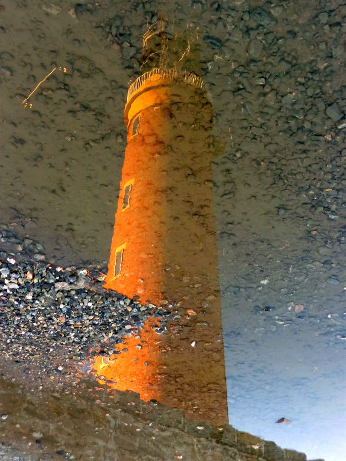 Guiding Light Reflected In A Puddle, Isle Of Lewis, Outer Hebrides