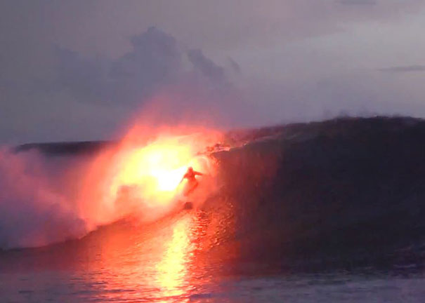 Surfers Set The Sea on Fire With Flares