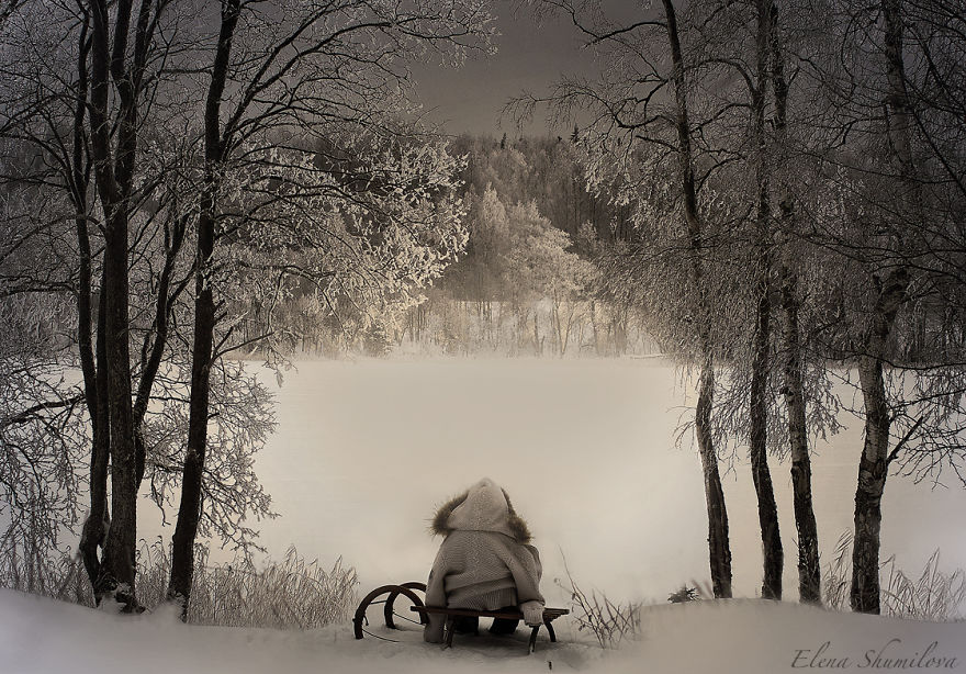 Child in winter coat sitting on sled, surrounded by snowy forest, capturing a magical scene on a Russian farm. Child in winter coat sitting on sled, surrounded by snowy forest, capturing a magical scene on a Russian farm.
