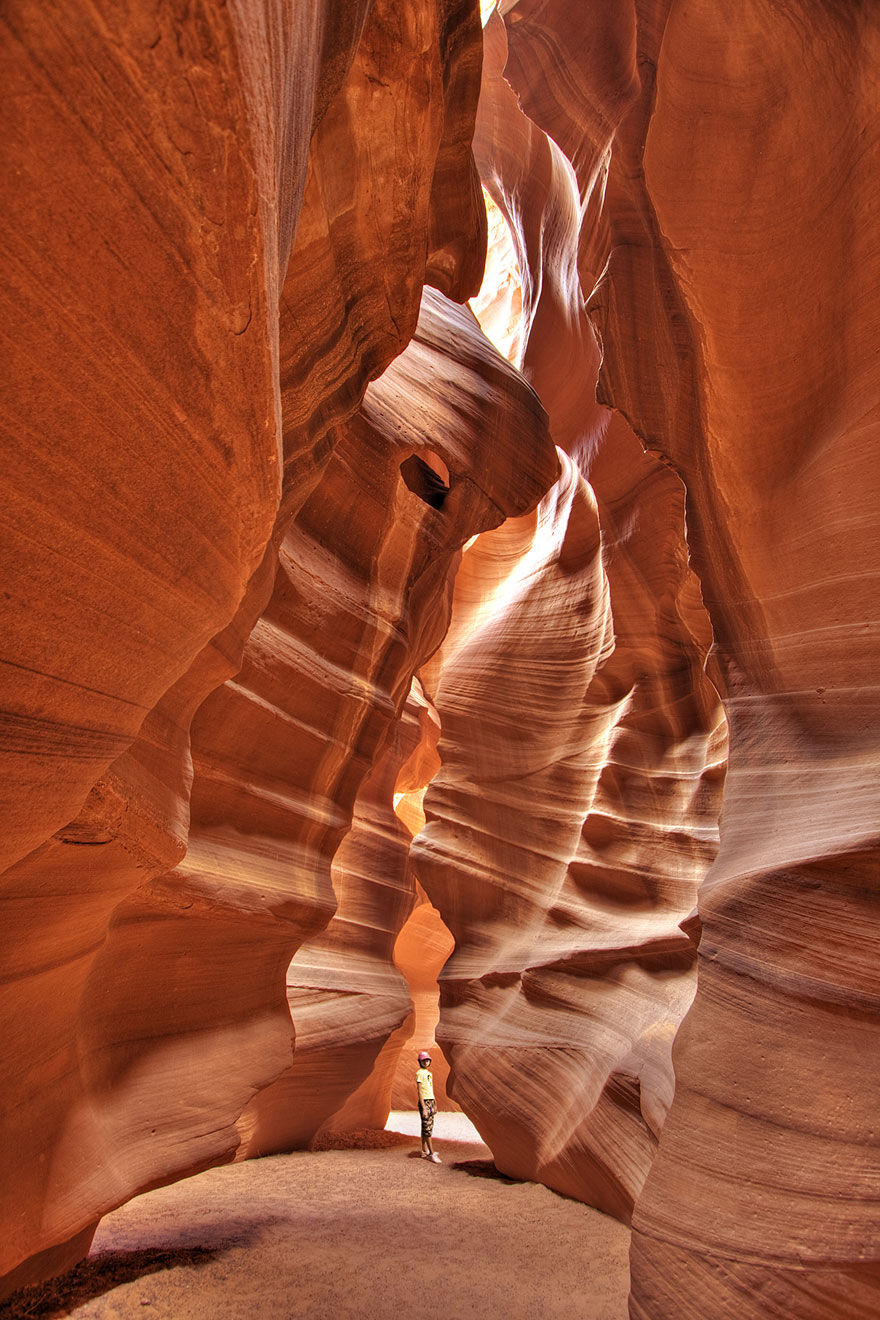 Person standing in Antelope Canyon, USA Person standing in Antelope Canyon, USA