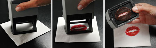 Creative business card with a lipstick mark stamp being applied to a napkin. Creative business card with a lipstick mark stamp being applied to a napkin.