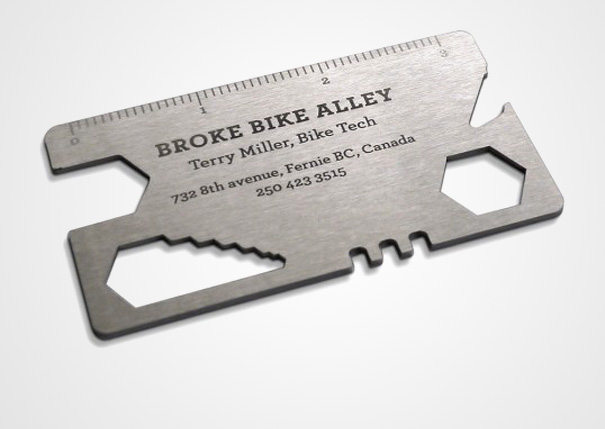 Creative business card shaped like a multifunctional tool for a bike tech, featuring contact details. Creative business card shaped like a multifunctional tool for a bike tech, featuring contact details.