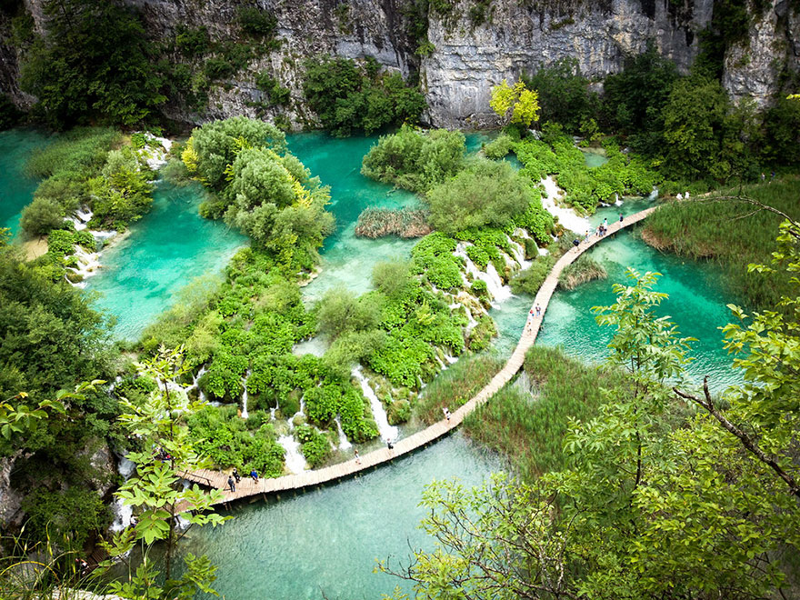 People walking in Plitvice Lakes, Croatia People walking in Plitvice Lakes, Croatia