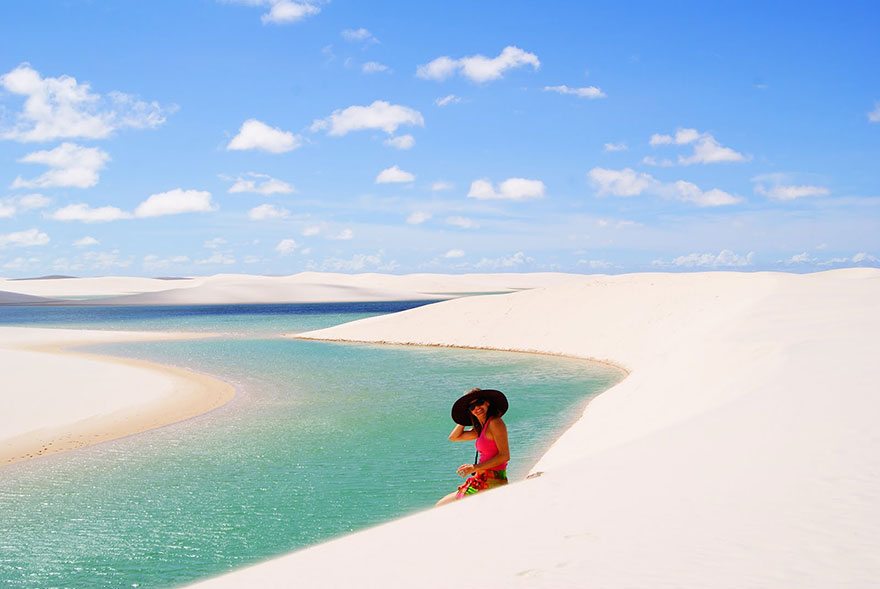 Person swimming in Lençóis Maranhenses, Brazil Person swimming in Lençóis Maranhenses, Brazil