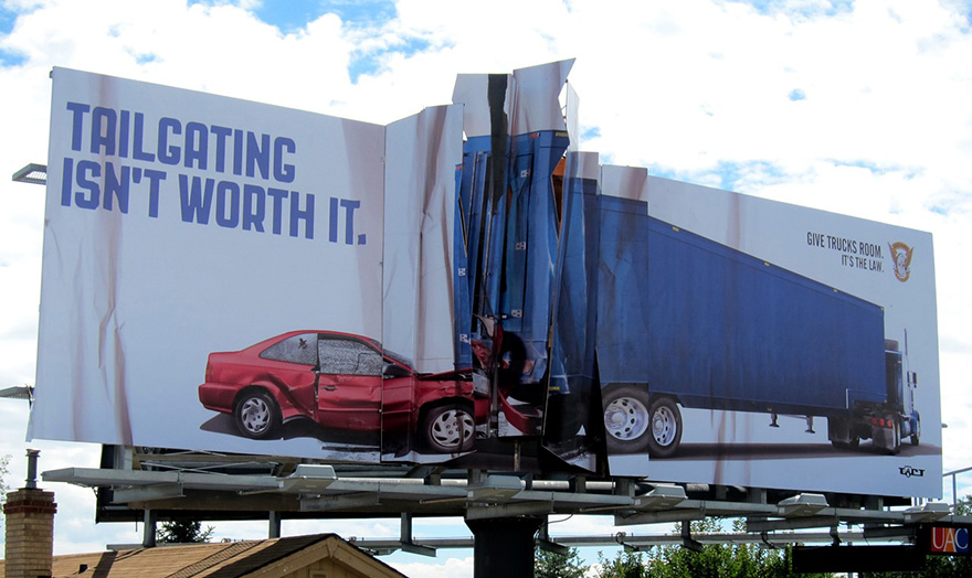 Powerful advertisement showing a damaged car and truck with text "Tailgating isn't worth it. Powerful advertisement showing a damaged car and truck with text "Tailgating isn't worth it.