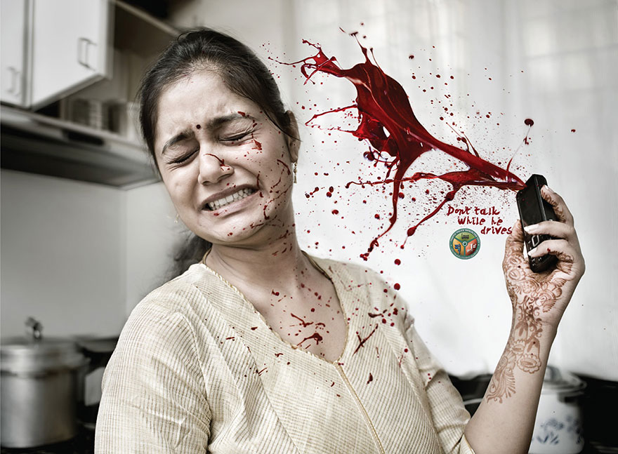 Woman in distress with phone, red splash effect; powerful advertisement emphasizing not to talk while driving. Woman in distress with phone, red splash effect; powerful advertisement emphasizing not to talk while driving.