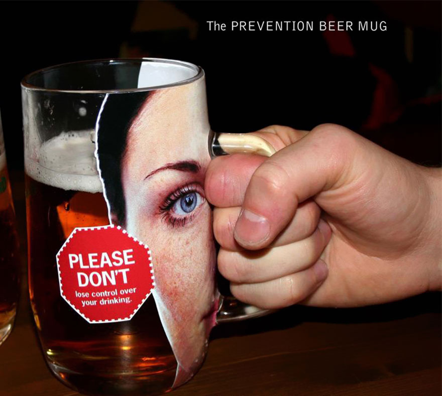Beer mug with a face print and message urging drinking control, demonstrating powerful advertisement design. Beer mug with a face print and message urging drinking control, demonstrating powerful advertisement design.