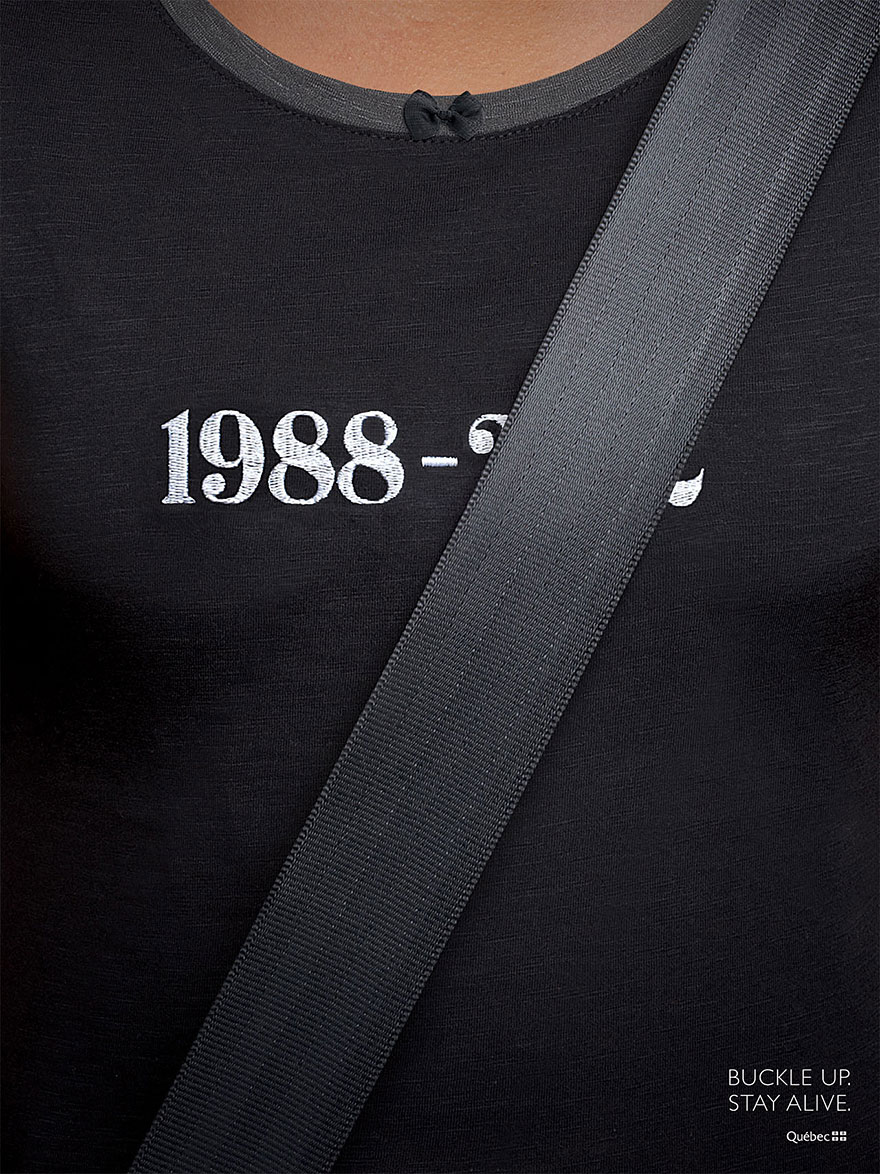 Powerful advertisement promoting road safety with a seatbelt crossing dates on a black shirt. Powerful advertisement promoting road safety with a seatbelt crossing dates on a black shirt.
