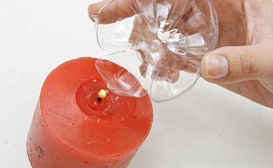 Recycling old plastic bottles by creating a candle holder. Recycling old plastic bottles by creating a candle holder.