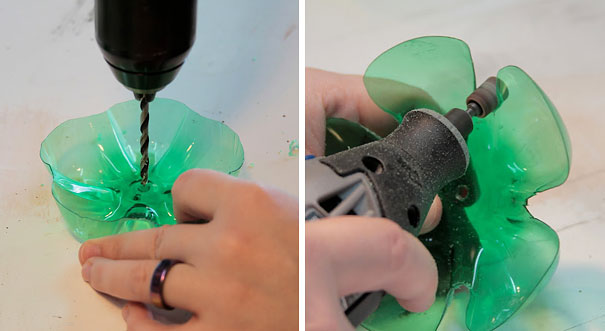 Recycling plastic bottles creatively by drilling into a cut green bottle. Recycling plastic bottles creatively by drilling into a cut green bottle.