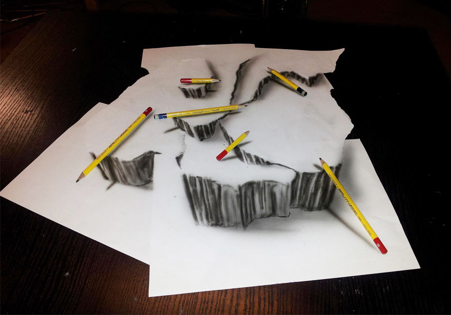 Realistic 3D drawing of cliffs on paper with pencils creating a stunning illusion. Realistic 3D drawing of cliffs on paper with pencils creating a stunning illusion.