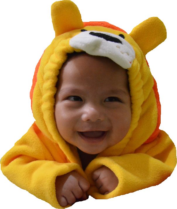 Smiling baby dressed in a bright yellow and orange Halloween costume, cute children's Halloween costume ideas.