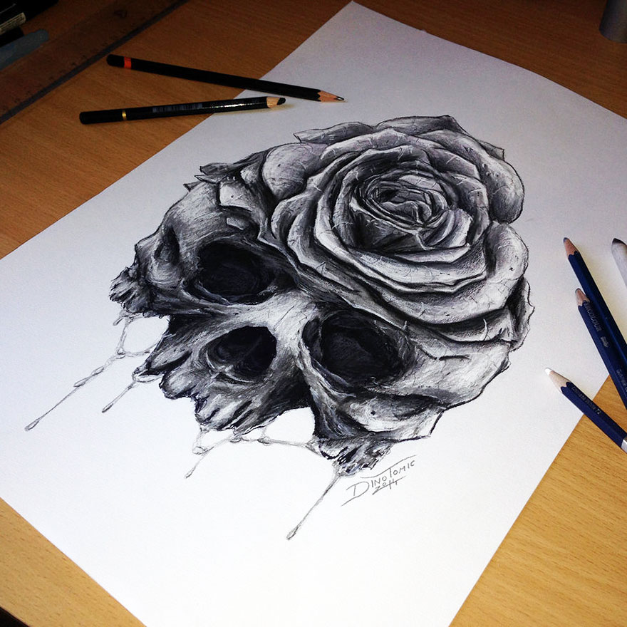 Pencil drawing by Dino Tomic depicting a skull and rose fusion, showcasing intricate details on a wooden desk. Pencil drawing by Dino Tomic depicting a skull and rose fusion, showcasing intricate details on a wooden desk.