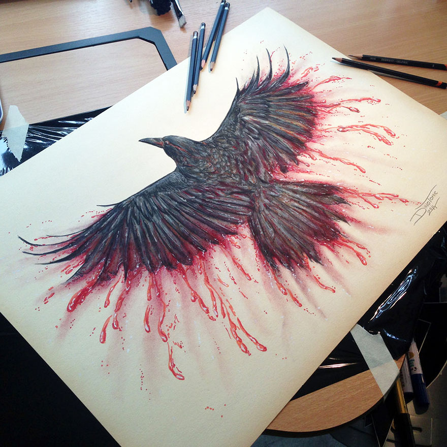 Expressive pencil drawing of a crow with red splashes by Dino Tomic on a drawing table. Expressive pencil drawing of a crow with red splashes by Dino Tomic on a drawing table.