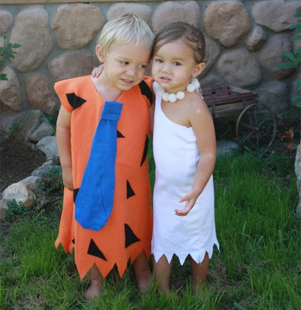 Two young children wearing Halloween costumes inspired by cartoon characters, perfect for children's Halloween costume ideas.