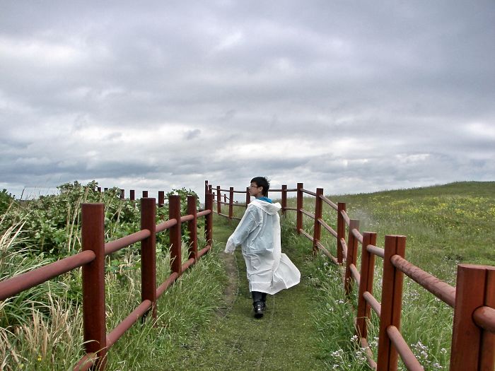Where Am I? A Boy At Puberty. Jeju Island, Seongsan Ilchool Bong, South Korea.