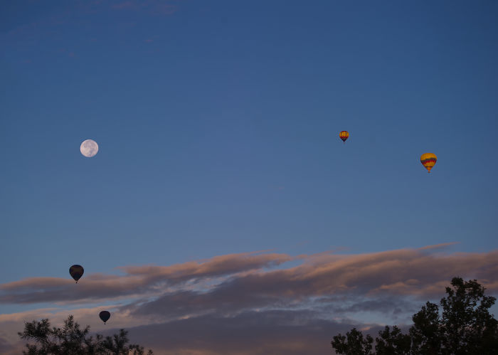 Balloons With Moon At Sunrise