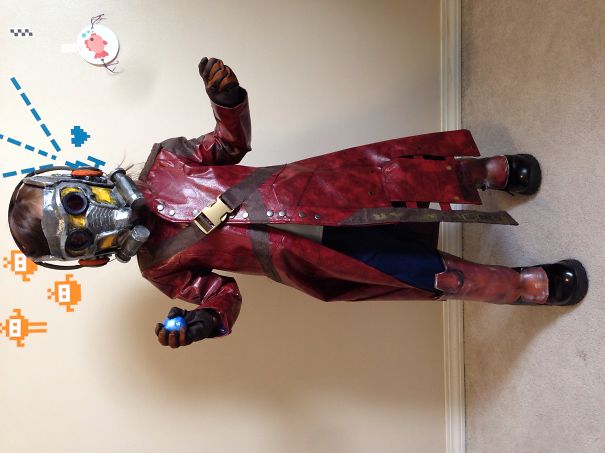 Child in detailed Star-Lord costume wearing mask and red coat, showcasing children's Halloween costume ideas for boys and girls.