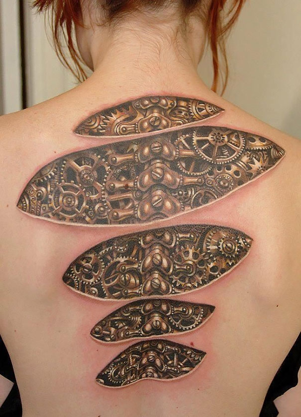 3D tattoo of mechanical gears on a woman's back, creating an illusion of exposed machinery.