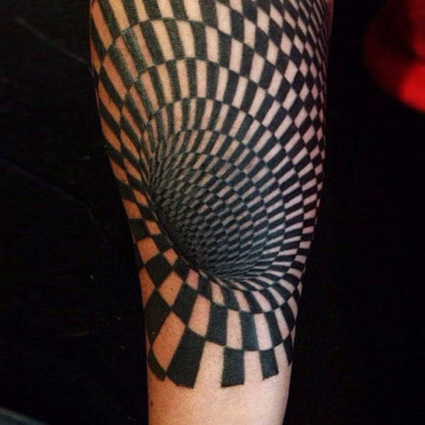 3D tattoo with optical illusion pattern twisting on skin.