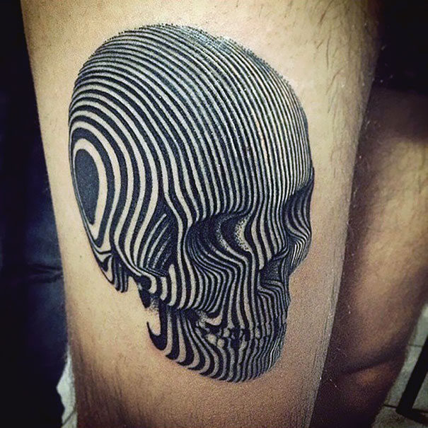 3D tattoo of a skull with optical illusion stripes creating a mind-twisting effect.