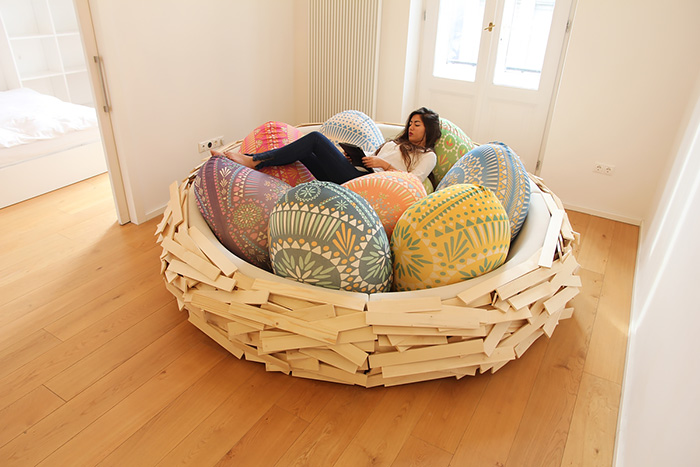 Giant Birdnest: Wooden Bed Filled With Soft Egg-Shaped Pillows