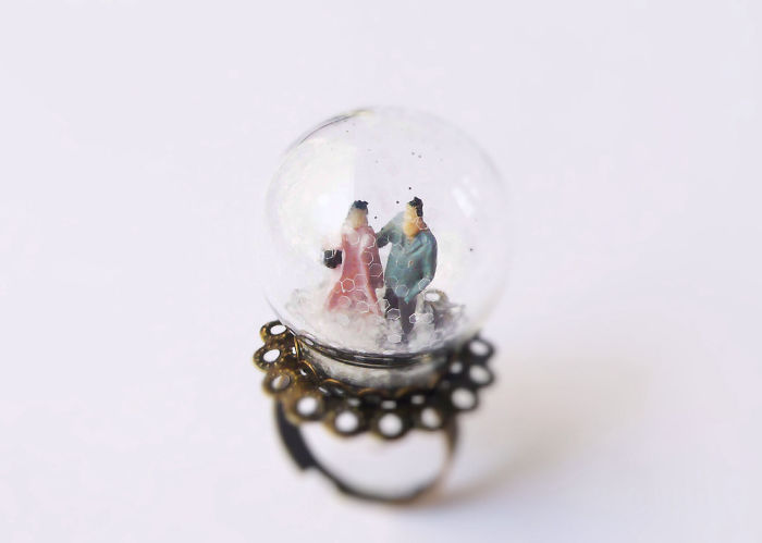 People Walking While Snowing Ring