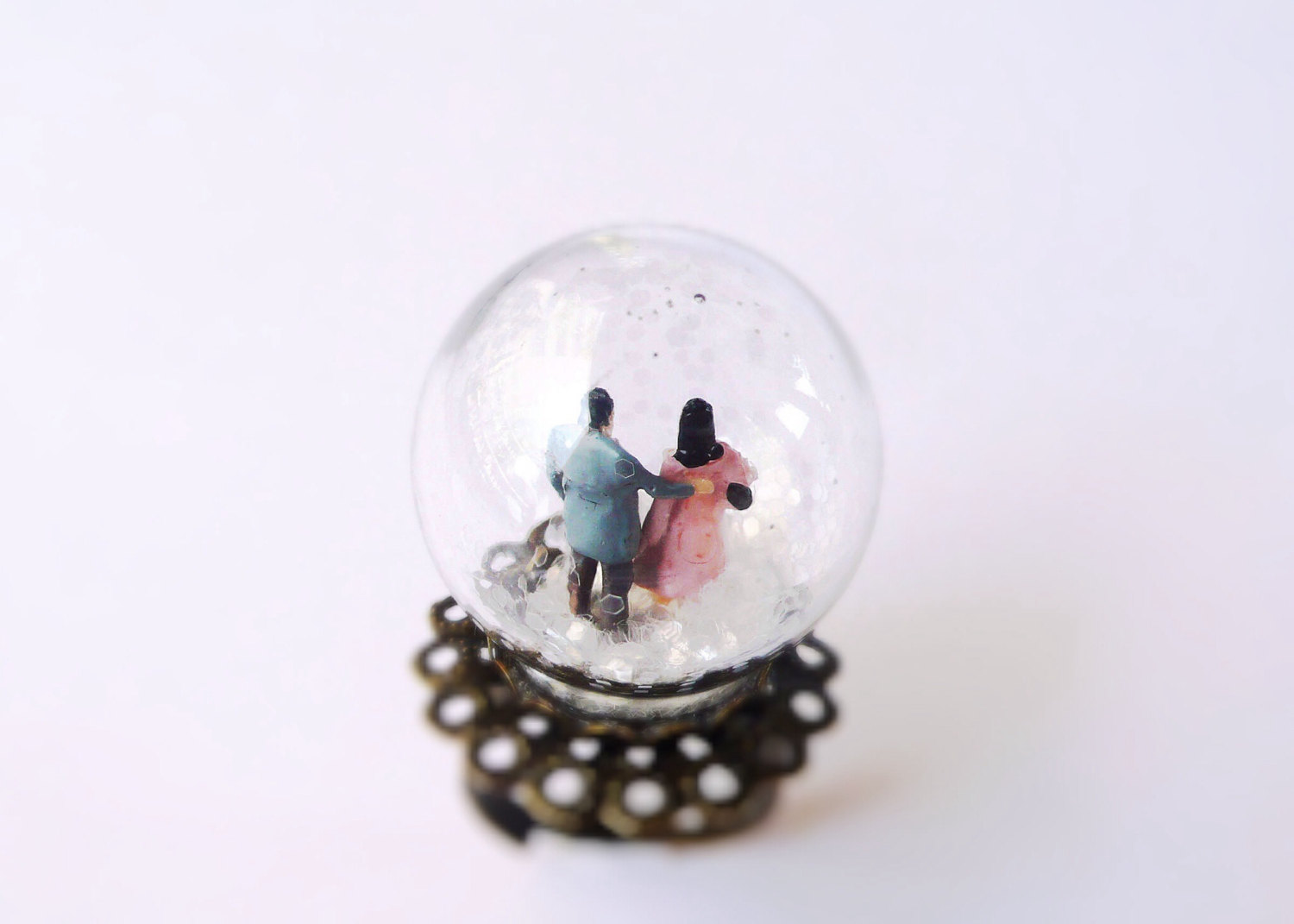 People Walking While Snowing Ring