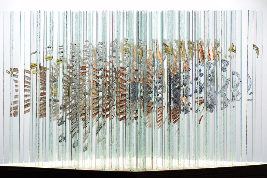 Glass Sculpture Made Of 160 Hand Painted Glass Strips Reveals Four Hidden Animals When Rotated Glass Sculpture Made Of 160 Hand Painted Glass Strips Reveals Four Hidden Animals When Rotated