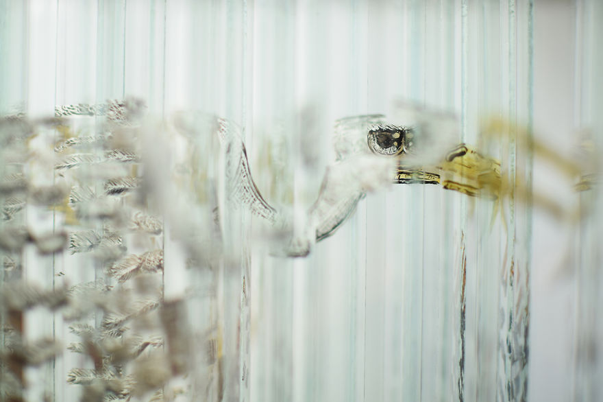 Glass Sculpture Made Of 160 Hand Painted Glass Strips Reveals Four Hidden Animals When Rotated Glass Sculpture Made Of 160 Hand Painted Glass Strips Reveals Four Hidden Animals When Rotated