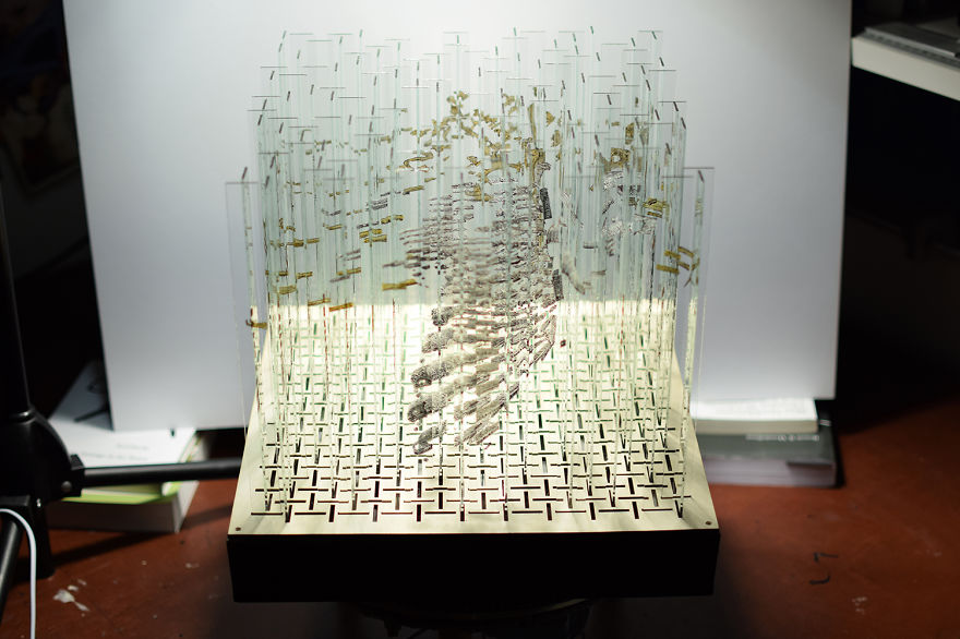 Glass Sculpture Made Of 160 Hand Painted Glass Strips Reveals Four Hidden Animals When Rotated Glass Sculpture Made Of 160 Hand Painted Glass Strips Reveals Four Hidden Animals When Rotated