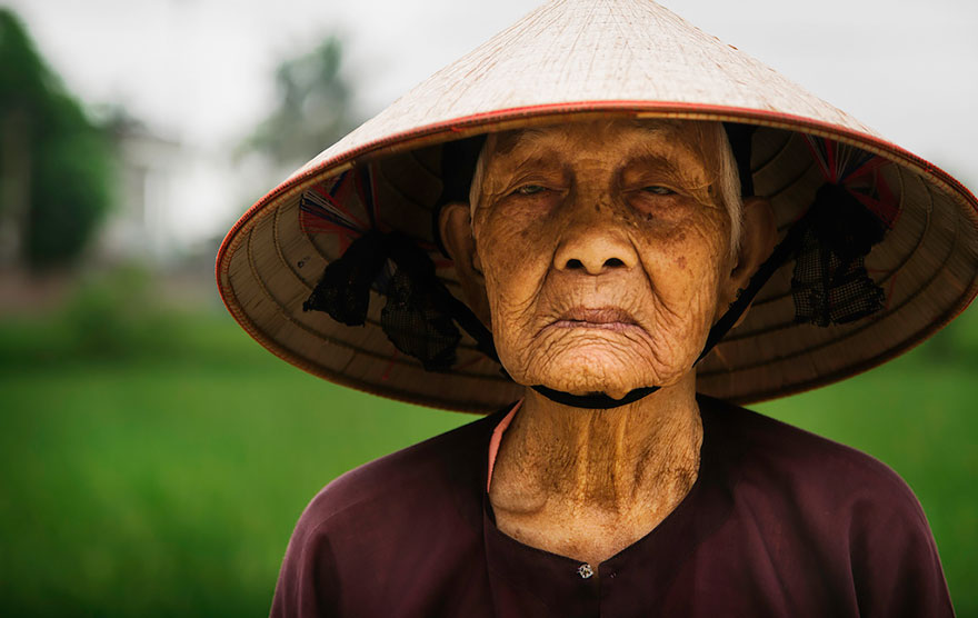 Rice Farmer In Small Vietnamese Village