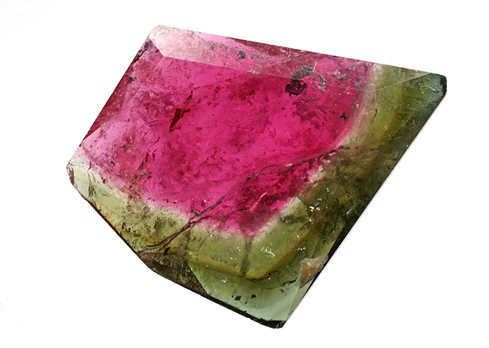 Beautiful mineral with a vibrant pink center and green edges, highlighting exquisite natural formations.