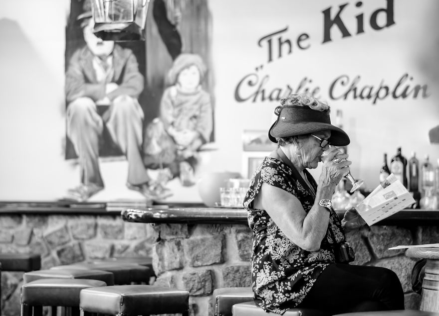 Woman Having A Beer In Barcelona.