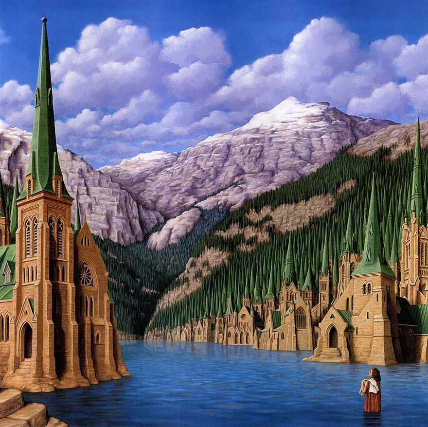 Optical illusion art by Rob Gonsalves shows mirrored cathedrals blending into mountains by a tranquil lake. Optical illusion art by Rob Gonsalves shows mirrored cathedrals blending into mountains by a tranquil lake.