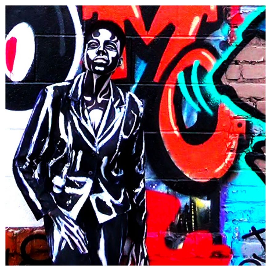 A Real Person Transformed Into A 2d Graffiti Art Stencil