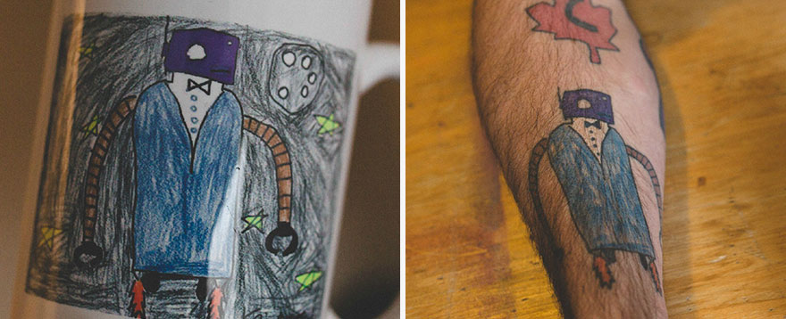 Father's arm with tattoo of son's drawing featuring a robot in a blue suit with a purple face.
