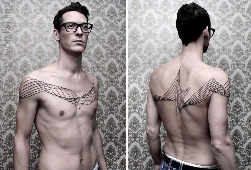 Geometric line tattoos by Chaim Machlev elegantly flow across the chest and back of a man wearing glasses.