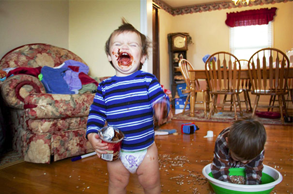 The Little Ones Sneak Into The Pantry And Find A Container Of Frosting